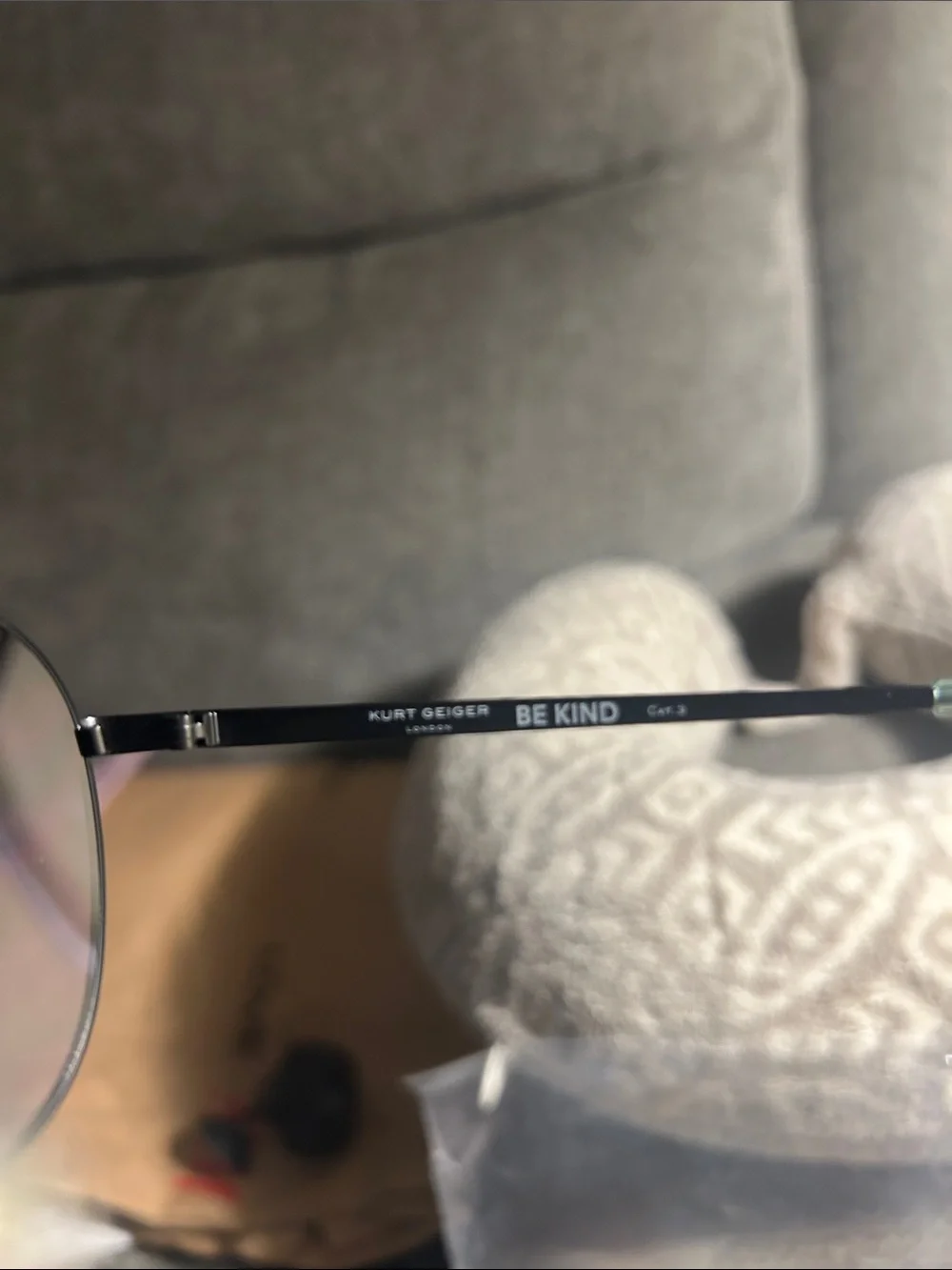 Kurt Geiger Black Frame Sunglasses with Purple Lenses
